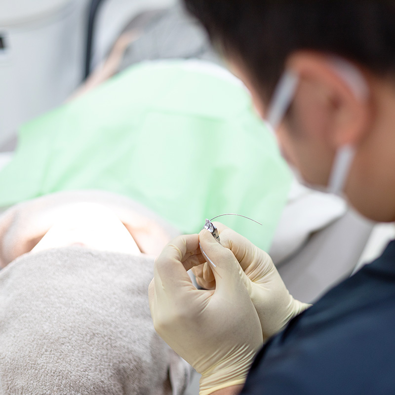 矯正を学ぶ先生